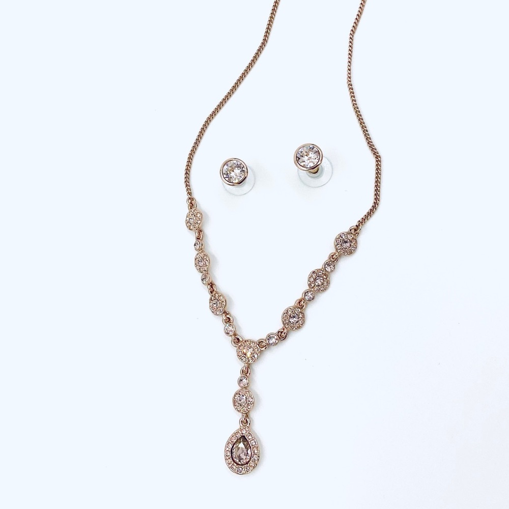 Givenchy rose gold tone pendant necklace and studs